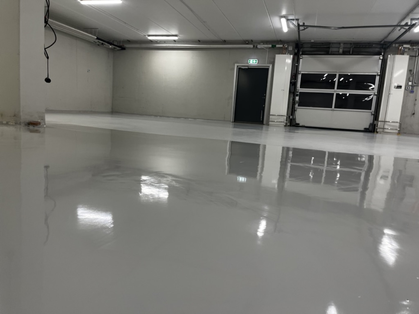 Sol de garage avec UQESH® PF et TAP750 chez Hägernäshuset